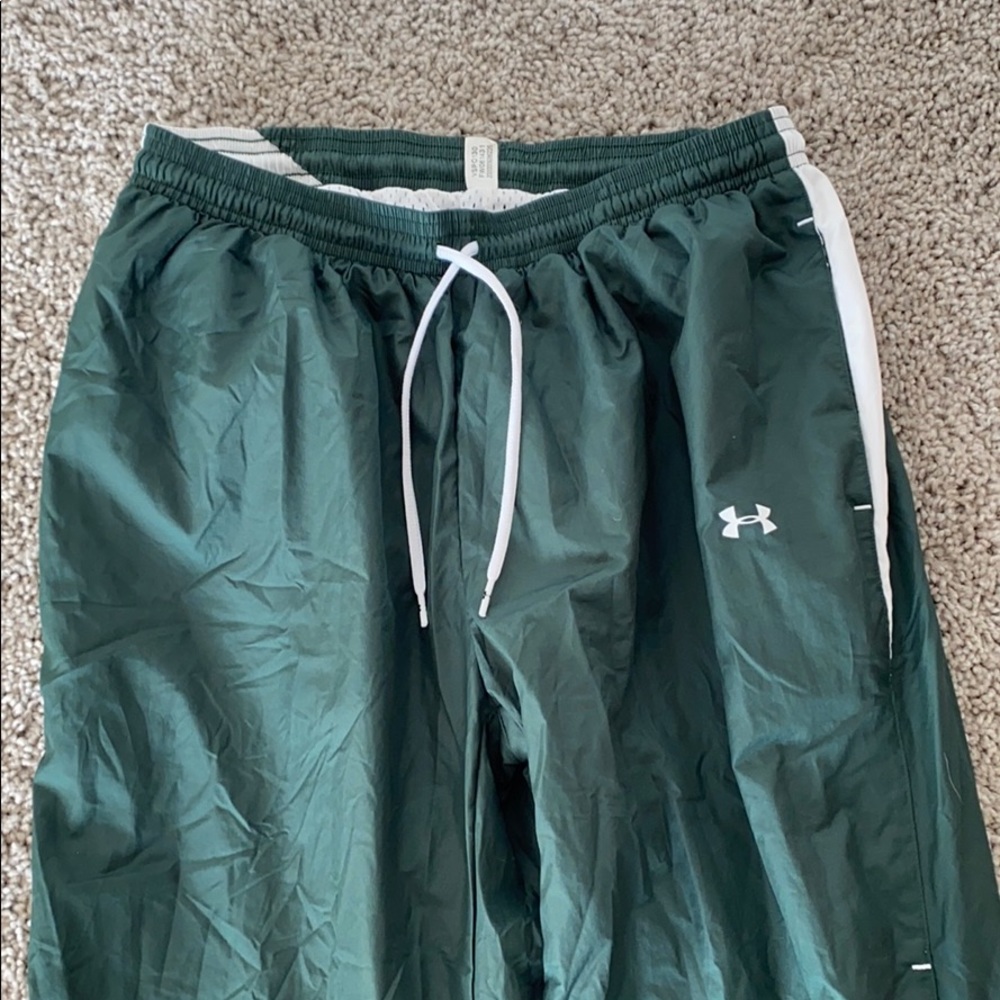 Green windbreaker pants